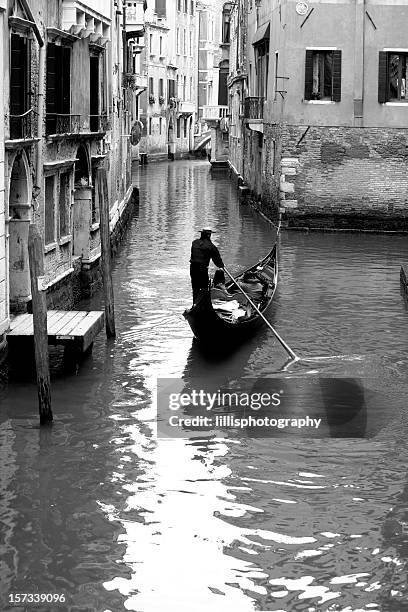 gondola and canal in venice - gondolier stock pictures, royalty-free photos & images