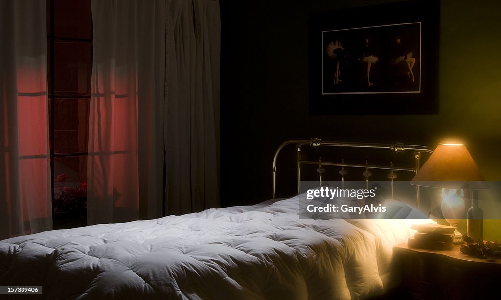 Romantic or lonely bedroom-empty bed,nightlight,window
