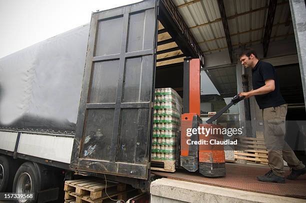 loading a truck - food transportation stock pictures, royalty-free photos & images