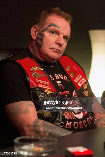 Christian Mueller, head of the 'West Central' chapter of the Hells Angels, speaks to media following the defection of 30 members of the rival...