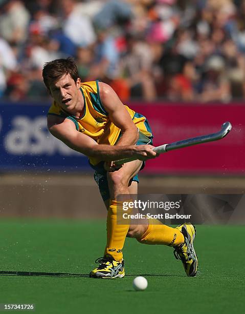 Fergus Kavanagh of Australia passes the ball during the match between Australia and the Netherlands during day two of the Champions Trophy on...