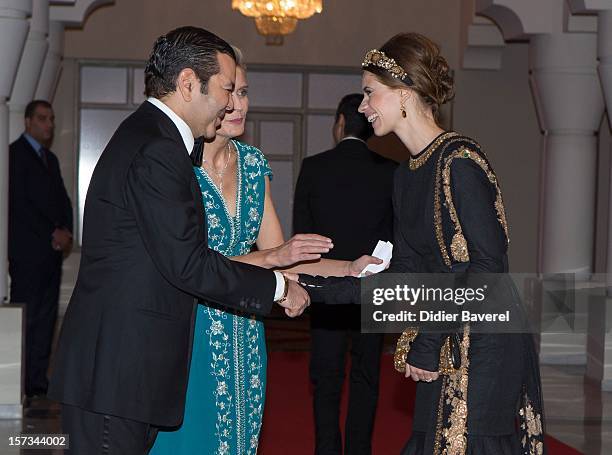 Prince Moulay Rachid of Morocco greets a guest before the Gala Dinner at the Tribute to Hindi Cinema ceremony at the 12th Marrakech international...