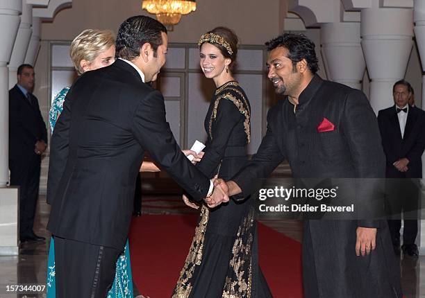 Prince Moulay Rachid of Morocco greets Indian actors before the Gala Dinner at the Tribute to Hindi Cinema ceremony at the 12th Marrakech...