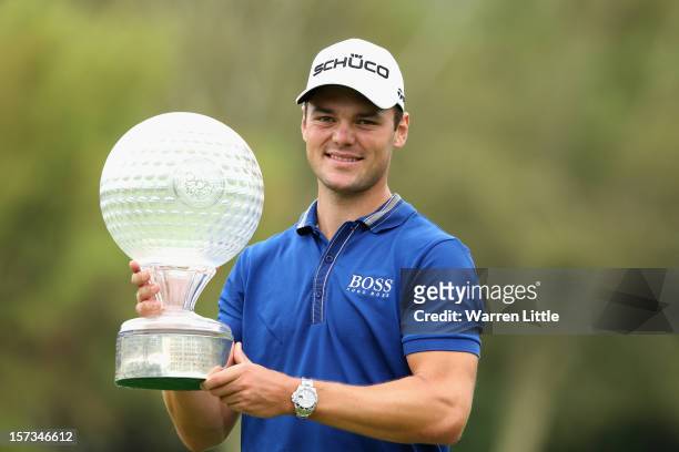 Martin Kaymer of Germany poses with the trophy after winning the Nedbank Golf Challenge at the Gary Player Country Club on December 2, 2012 in Sun...
