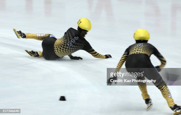 Sayuri Shimizu of Japan falls down in Final A of Ladies 300m Relay during day three of the ISU World Cup Short Track at Nippon Gaishi Arena on...