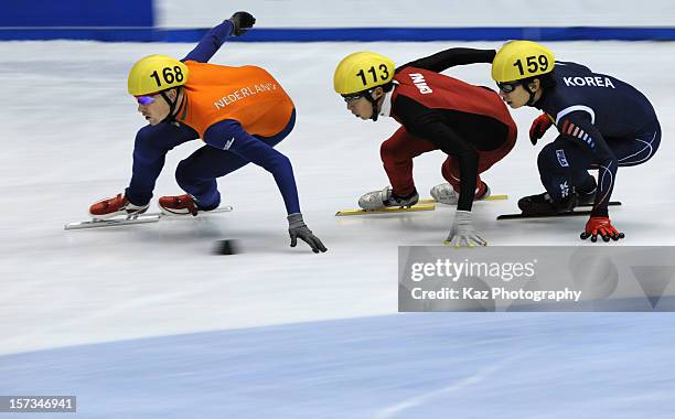 Freek Van Der Wart of Netherlands followed by Dequan Chen of China and Yoon-Gy Kwak of Korea in Final A of Men 5000m Relay during day three of the...