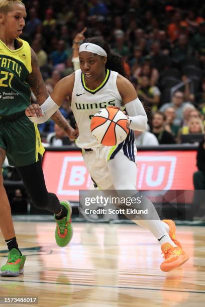 Arike Ogunbowale of the Dallas Wings drives to the basket during the game against the Seattle Storm on August 2, 2023 at Climate Pledge Arena in...