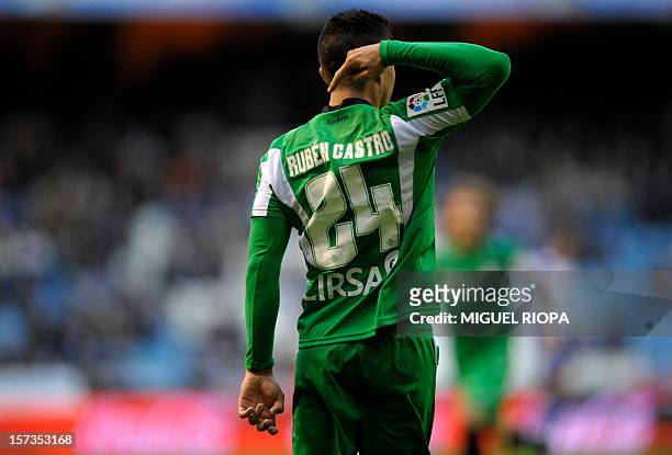 Betis' forward Ruben Castro celebrates after scoring a goal during the Spanish league football match Deportivo vs Betis at Riazor's Stadium in...