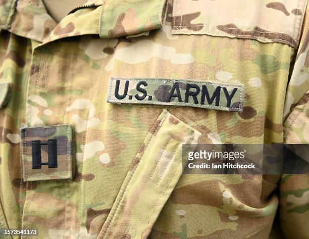 Army uniform insignia is seen on a soldier from the 16th Combat Aviation Brigade at the Townsville airport as part of exercise 'Talisman Sabre 23' on...