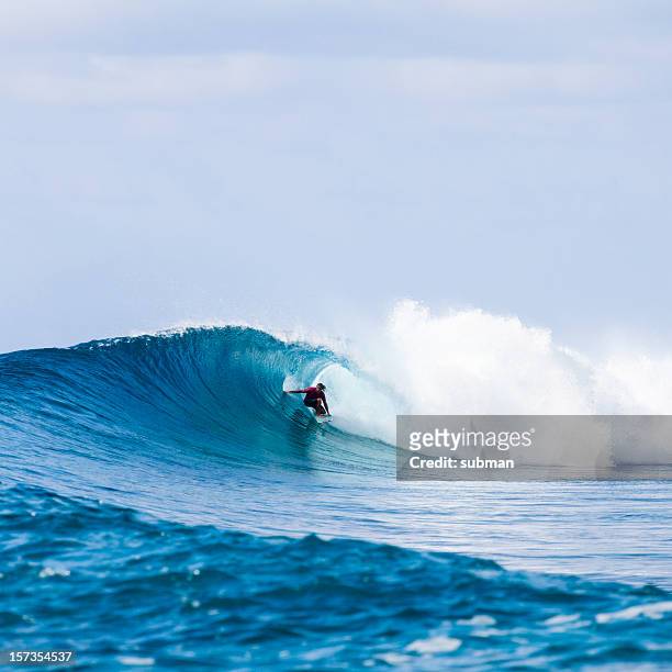 catching a barrel - surf tube stock pictures, royalty-free photos & images