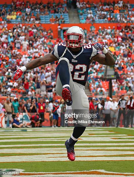 Stevan Ridley of the New England Patriots scores a touchdown during a game against the Miami Dolphins at Sun Life Stadium on December 2, 2012 in...