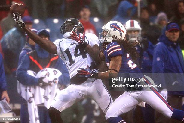 Justin Blackmon of the Jacksonville Jaguars cannot make the catch during an NFL game as Stephon Gilmore of the Buffalo Bills commits pass...