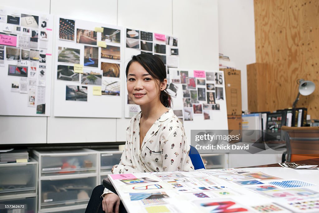 Portrait of a confident young women at work in a creative office environment