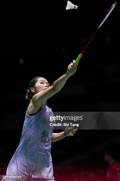 Ratchanok Intanon of Thailand competes in the Women's Singles Second Round match against Supanida Katethong of Thailand on day three of the Japan...