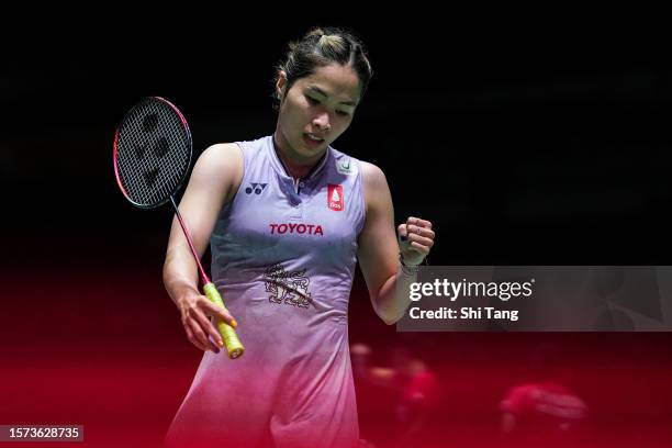 Ratchanok Intanon of Thailand reacts in the Women's Singles Second Round match against Supanida Katethong of Thailand on day three of the Japan Open...