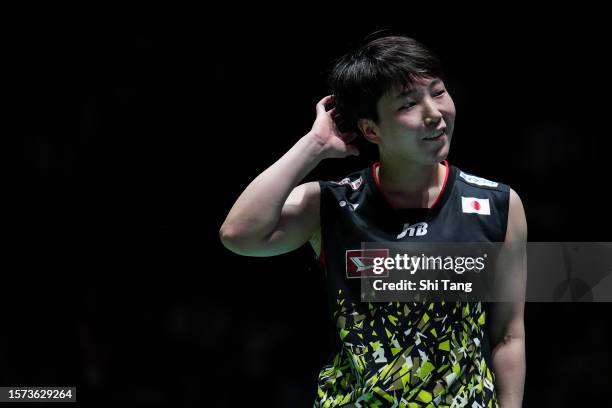 Akane Yamaguchi of Japan reacts in the Women's Singles Second Round match against Kim Ga Eun of Korea on day three of the Japan Open at Yoyogi...