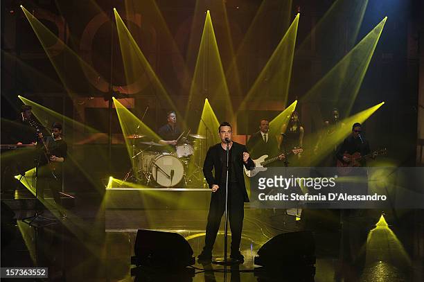 Robbie Williams performs at 'Che Tempo Che Fa' Italian TV Show on December 2, 2012 in Milan, Italy.