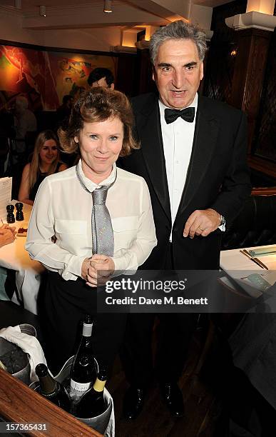 Actors Imelda Staunton and Jim Carter, working as waitors, attend One Night Only at The Ivy, featuring 30 stage and screen actors working as staff...