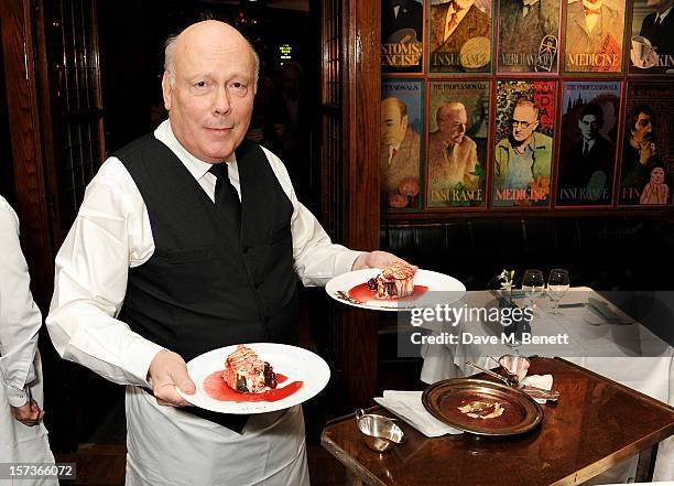 Lord Julian Fellowes, working as a waiter, attends One Night Only at The Ivy, featuring 30 stage and screen actors working as staff during dinner at...