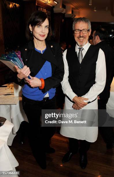 Actress Elizabeth McGovern , working as a hostess, and Griff Rhys Jones, working as a waiter, attend One Night Only at The Ivy, featuring 30 stage...