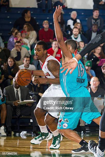 Kris Joseph of the Maine Red Claws plays against Andrew Goudelock of the Sioux Falls Skyforce on December 2, 2012 at the Portland Expo in Portland,...