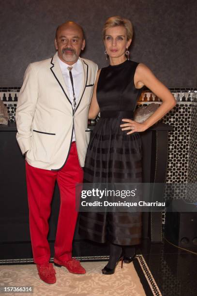 French Shoes designer Christian Louboutin and International Marrakech Film Festival Director Melita Toscan du Plantier attend the Dior dinner at...