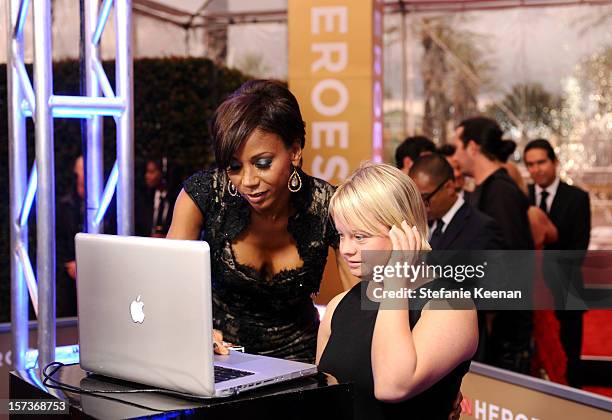 Actresses Holly Robinson Peete and Lauren Potter attend the CNN Heroes: An All Star Tribute at The Shrine Auditorium on December 2, 2012 in Los...