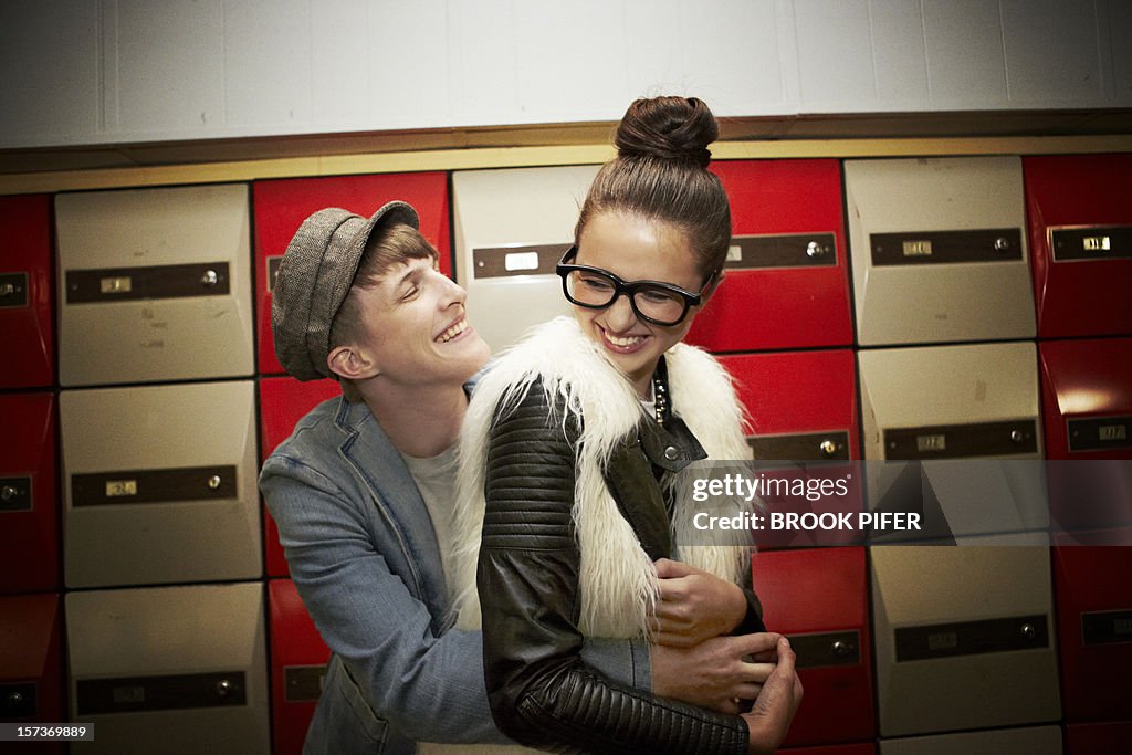 Young adults laughing together