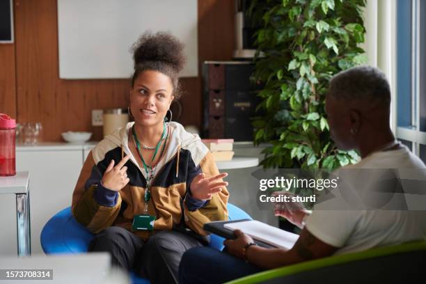 youth worker with student - school counselor stock pictures, royalty-free photos & images