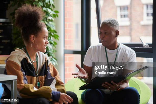 youth worker with student - student advisor stock pictures, royalty-free photos & images