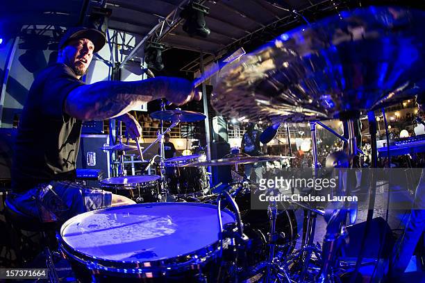 Drummer Wuv Bernardo of P.O.D. Performs onboard Shiprocked cruise on November 28, 2012 in Fort Lauderdale, Florida.
