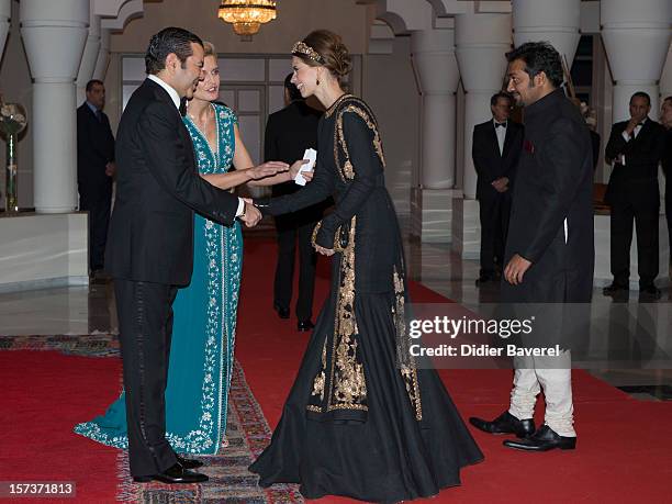 Prince Moulay Rachid greets Indian actress Kalki Koechlin and actor Anurag Kashyap before the Gala Dinner at the Tribute to Hindi Cinema ceremony at...