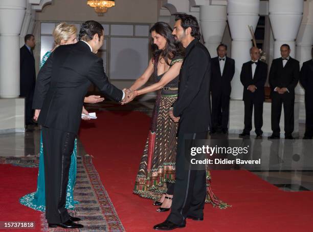 Prince Moulay Rachid greets Indian Actor Indian actor Arjun Rampal and his wife Mehr Jessia before the Gala Dinner at the Tribute to Hindi Cinema...