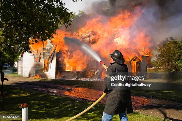 putting out the fire - fire prevention stock pictures, royalty-free photos & images