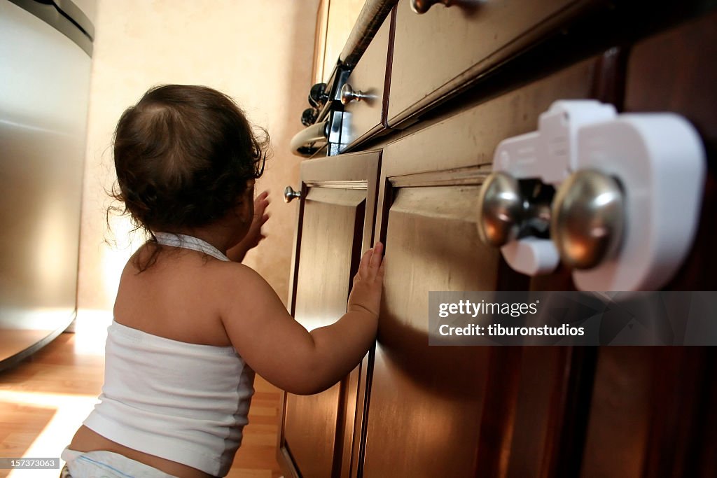 Child Proofing 3 Toddler Exploring Kitchen