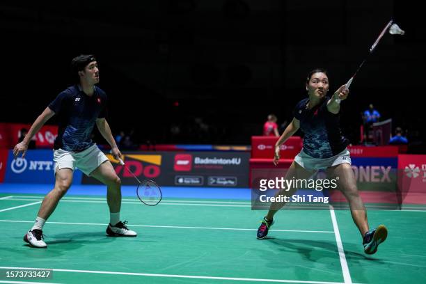 Tang Chun Man and Tse Ying Suet of Hong Kong compete in the Mixed Doubles Second Round match against Yuta Watanabe and Arisa Higashino of Japan on...