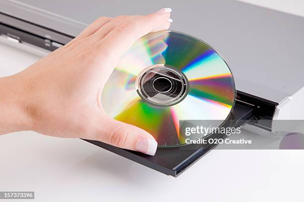 Hand Holding Cd Dvd High-Res Stock Photo - Getty Images