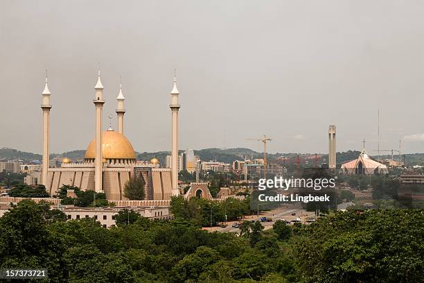 abuja ciudad de mezcla de religión - nigeria fotografías e imágenes de stock