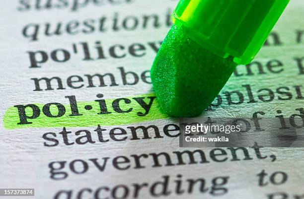 policy definition highlighted in dictionary - strategy stock pictures, royalty-free photos & images