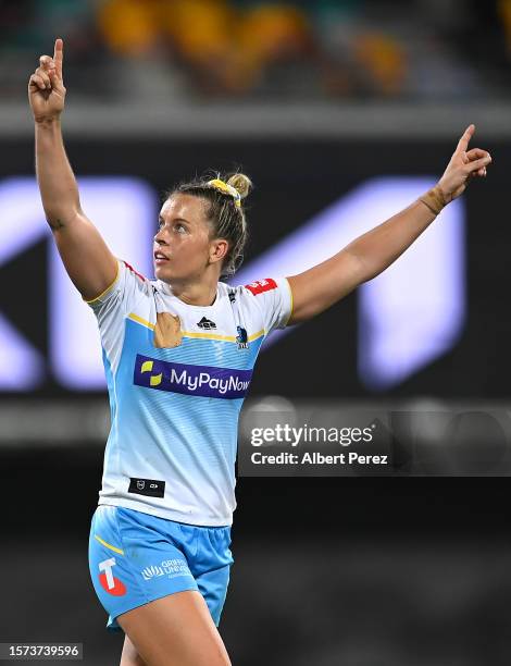 Lauren Brown of the Titans celebrates kicking the match winning field goal during the round two NRLW match between Brisbane Broncos and Gold Coast...