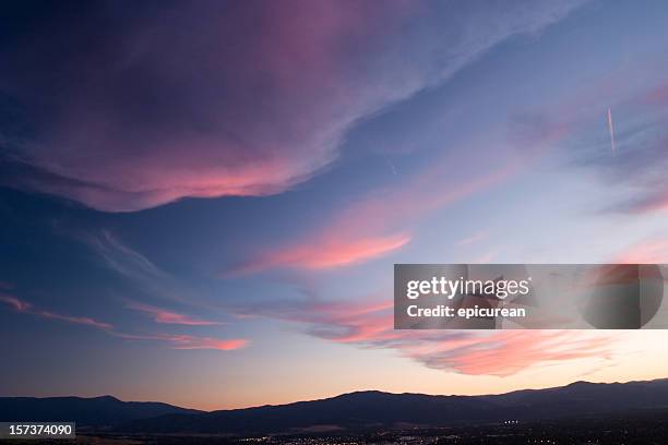 whispy sunset over missoula montana - missoula stock pictures, royalty-free photos & images