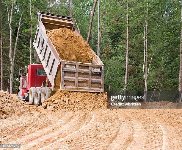 dump truck dumping - dumper truck stock pictures, royalty-free photos & images