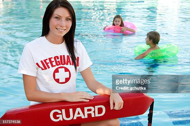 swimming pool supervision - female rescue worker stock pictures, royalty-free photos & images