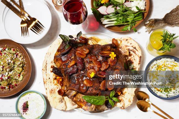 Lamb Shoulder platter with saffron, turmeric, pomegranate molasses, lime, cinnamon, dried apricots, medjool dates, rose water, lamb jus with Mast-o...