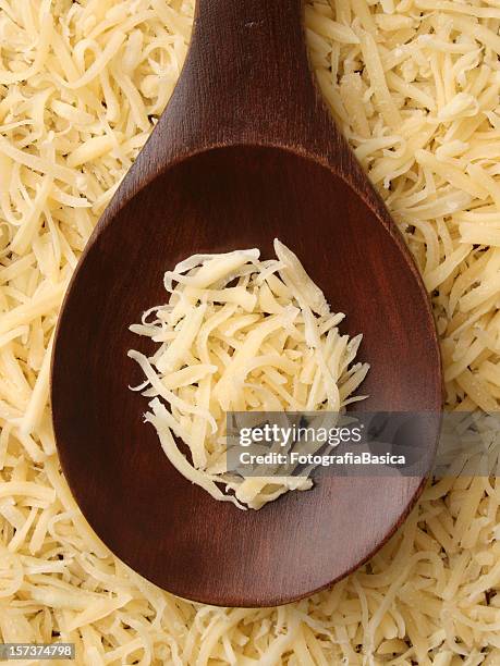 grated cheese - grated stock pictures, royalty-free photos & images
