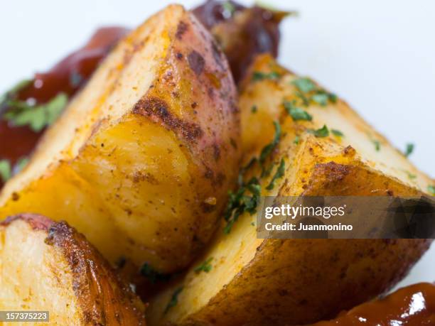 side roasted potatoes - roast potato stock pictures, royalty-free photos & images