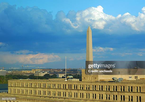 washington monument and department of interior after storm - u.s. department of the interior stock pictures, royalty-free photos & images
