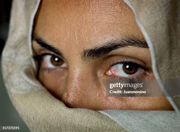 forty something muslim woman (no make up) - iraqi woman stock pictures, royalty-free photos & images