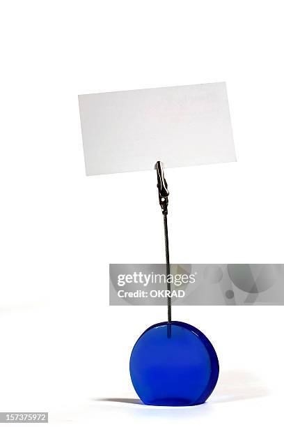 plastic photo holder with blank business card - papierklem stockfoto's en -beelden