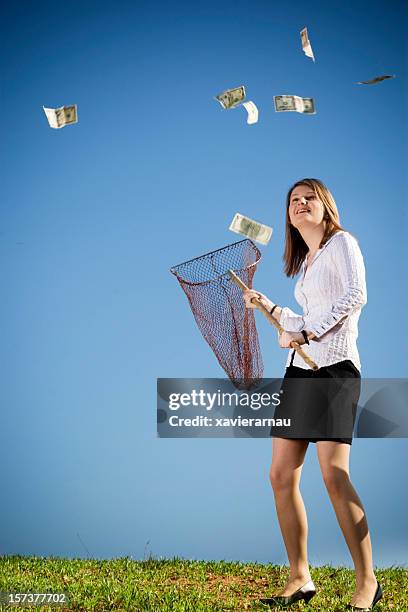 raining money - fishnet stockings stock pictures, royalty-free photos & images